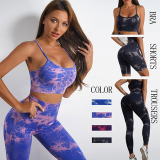 Stylish women's tie-dye print yoga suit with high-waisted trousers or shorts set, showcasing trendy activewear in vibrant colors.