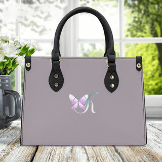 Elegant Gray Tote: Luxury Women's PU Leather Handbag with Butterfly Design and Sleek Black Handles, Versatile for Everyday Use