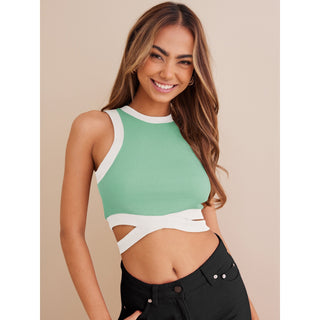 Stylish woman's green top with white accents showcased in the image