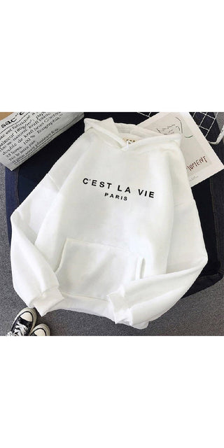 Stylish white hoodie with "C'est la vie Paris" graphic print. The simple yet trendy design makes this a versatile athleisure piece. Relaxed fit and comfortable material perfect for casual wear.