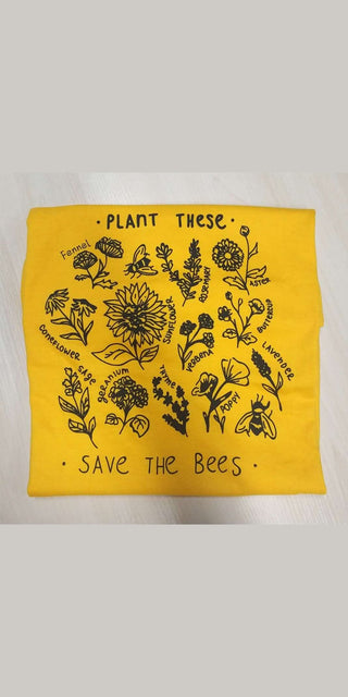 Vibrant yellow "Plant These" tee featuring intricate botanical illustrations to "Save the Bees" - a stylish, nature-inspired message.