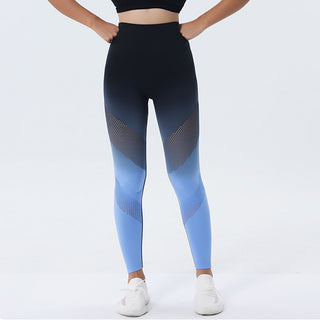 Stylish and sporty ombre performance leggings with sleek black and blue gradient design. Featuring a comfortable high-waisted fit and breathable mesh panels for active wear.