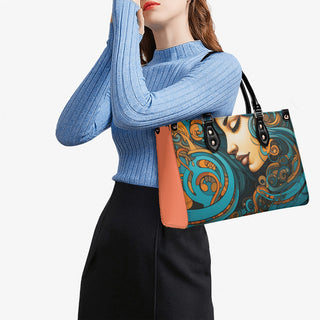 Elegant urban satchel with vibrant abstract design, complementing the stylish woman's fashion attire.