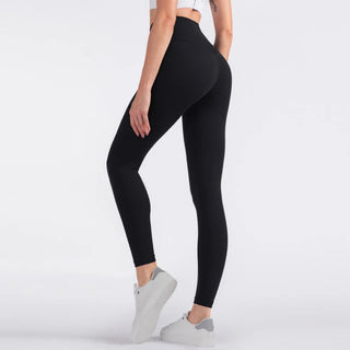 High-waisted black fitness leggings with a flattering silhouette, displayed on a mannequin in a K-AROLE Shopify store.