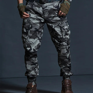 Stylish camo cargo pants with multiple pockets for men, featuring a tactical design in a modern camouflage pattern.