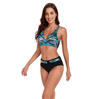 Vibrant printed halter swimsuit with high-waisted bottoms, showing a stylish and trendy beachwear look.