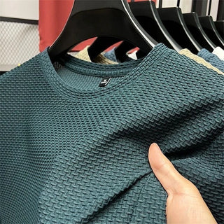 Stylish men's summer mesh t-shirt in dark green, featuring a round neckline and lightweight, breathable fabric for comfortable wear.