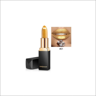 Shimmering gold lipstick with temperature-changing color in sleek black packaging, showcasing a sparkling statement lip