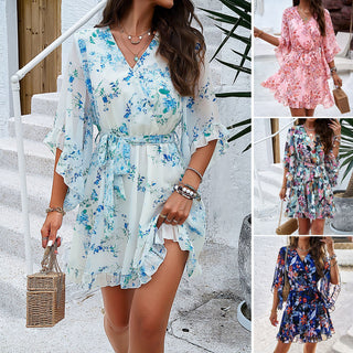 Floral print V-neck dress with lace-up ruffles, stylish and feminine outfit displayed on a model.