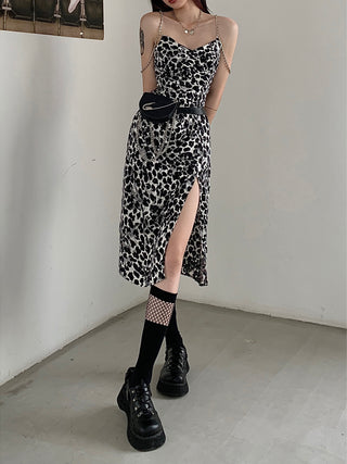 Sexy leopard print suspender dress with high slit, worn with edgy black boots
