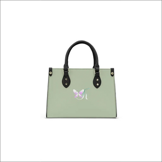 Elegant Women's PU Leather Handbag with Floral Emblem

This image shows a stylish tote bag in a light green color with a floral emblem embellishment. The bag features dual handles and a polished black trim, giving it a sleek and sophisticated design. The placement of the product in the center of the frame allows the bag's features to be clearly showcased.