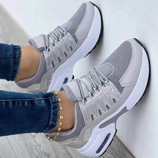 Lightweight Casual Sneakers - Stylish Women's Athletic Athleisure Shoes in gray and white, showcasing a sporty and fashionable design.