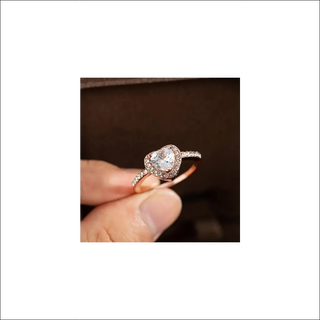 Heart-Shaped Crystal Engagement Ring on Delicate Rose Gold Band