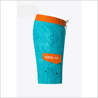 Vibrant tropical-print women's athletic shorts with a bold logo and drawstring waist for a comfortable, stylish workout look at the K-AROLE store.