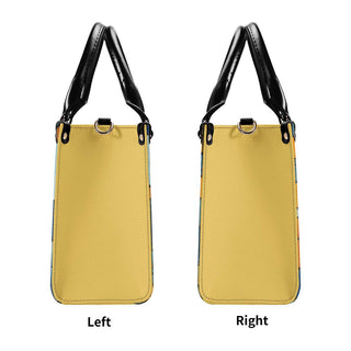 Elegant yellow leather tote bag with black patent leather handles and accents from the K-AROLE fashion label.