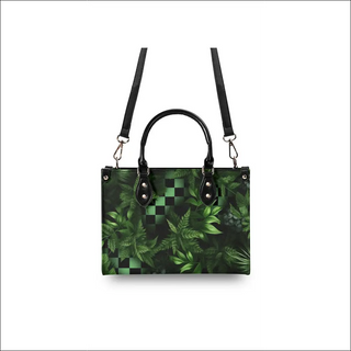 Stylish Green Floral Patterned Handbag: Elegant PU leather tote with unique artistic design, featuring lush tropical foliage and checkered motif. Versatile accessory for modern women's fashion.