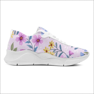 Elegant floral sneakers from K-AROLE. Colorful blossom pattern, supportive and stylish training shoes perfect for an active lifestyle. Comfortable and fashionable women's athletic footwear.