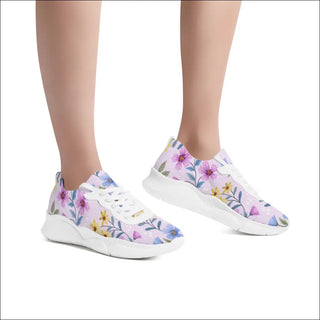 Stylish and supportive training shoes with vibrant floral print, perfect for an energetic workout at K-AROLE.