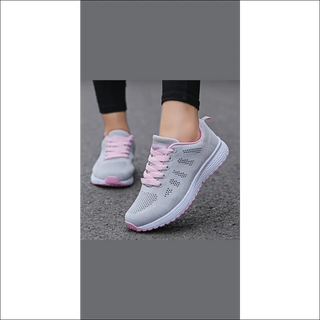 Light gray and pink women's fashion sneakers with breathable mesh upper and vulcanized outsole, ideal for casual walking, gym workouts, and daily wear.