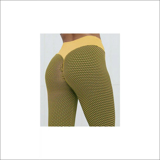 Chic geometric pattern leggings for active women. Tight-fitting, high-waisted design in a stylish yellow and black color scheme. Breathable, seamless fabric ideal for yoga, fitness, and everyday wear. Elevate your athleisure look with these sleek and comfortable leggings.