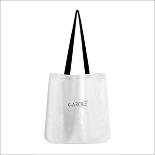 Stylish white tote bag with black handles and K-AROLE logo, showcasing a versatile and fashionable accessory for women.