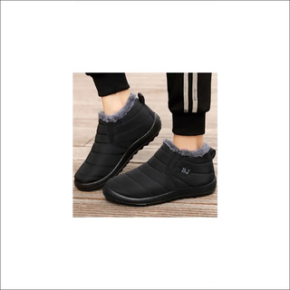 Stylish black winter boots with fur lining for women. Durable, non-slip soles provide stability and traction in cold weather conditions. Comfortable and warm shoes perfect for casual everyday wear or outdoor activities.