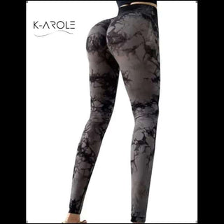 Stylish marble-patterned yoga pants from K-AROLE featuring a sleek, performance-focused design for active lifestyles.