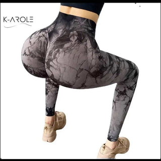 Stylish, high-performance yoga pants with trendy marble print, showcasing comfortable and flexible sportswear from K-AROLE.