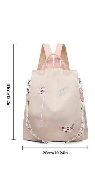 Stylish waterproof backpack with embroidered floral pattern. Perfect for women's travel and everyday use. Fashionable and functional design from the K-AROLE brand.