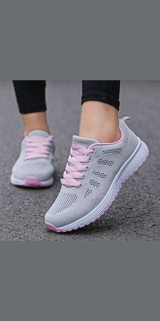Light gray and pink women's fashion sneakers with breathable mesh upper and vulcanized outsole, ideal for casual walking, gym workouts, and daily wear.