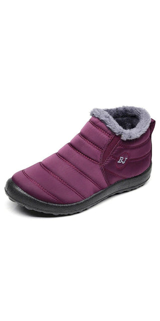 Plush winter ankle boots for women in vibrant purple, featuring a cozy faux fur lining and a durable, non-slip sole for comfortable warmth and traction.