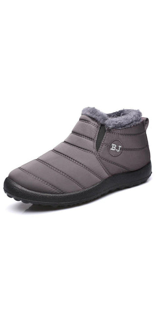 Plush grey winter boots with cozy fur lining for women's all-weather comfort.