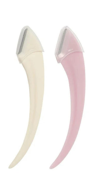 Stylish eyebrow grooming tools for precise, gentle shaping - twin eyebrow trimming knives in elegant ivory and pastel pink hues.