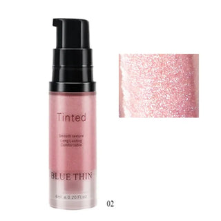 Shimmering highlighter powder spray in pink glitter from the K-AROLE cosmetics line, featuring a sleek black pump for easy application on face and body.
